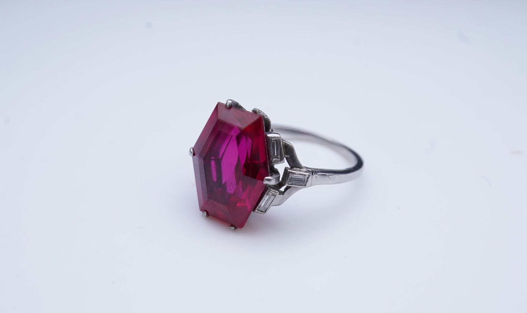 A synthetic ruby and diamond ring